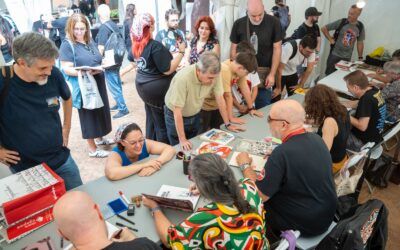 Los artistas invitados al Salón firman en la Plaza del Príncipe