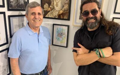 Manuel Darias recibe una caricatura de Pepe Farruqo